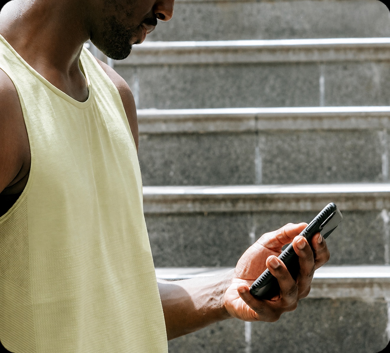 A fitness professional using their phone